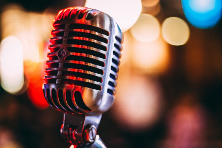 A microphone with a blurry background