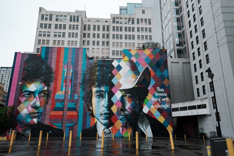 mural portrait of Bob Dylan on side of building